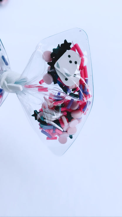 Pink ghost shaker bow