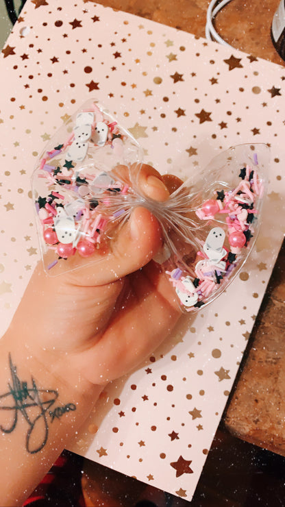 Pink ghost shaker bow